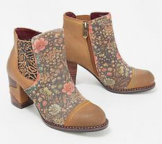 Everyone is an artist in these colorful boots! Carefully crafted in rich leather, floral designs, and rainbow stitching details, the Melvina is a must for the modern woman who wants to infuse feminine flair into her footwear collection.  (And just think of all the creative street cred you get every time you step out in them.) From Spring Step. Spring Multicolor Heeled Boots With Round Toe, Multicolor Leather Boots For Spring, Leather Boots With Floral Print For Spring, Fall Floral Print Boots With Round Toe, Bohemian Multicolor Boots For Spring, Multicolor Bohemian Boots For Spring, Spring Multicolor Leather Boots, Vintage Spring Lace-up Ankle Boots, Brown Floral Print Boots For Fall