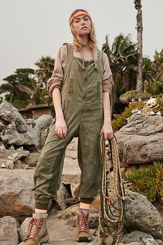 Get on the right track in this so cool slouchy jumpsuit featured in a utility-inspired design with cargo pockets with a distressed, lived-in look.* Coverall silhouette* Cinched ankles* Zip-up front Slouchy Jumpsuit, Farm Clothes, Cargo Khaki, Free People Store, New Today, Fp Movement, Fast Track, Color Khaki, Boho Clothing