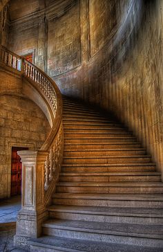 a spiral staircase in an old building