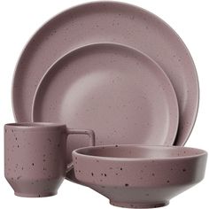 a set of purple dishes and cups with speckled glazes on the plates