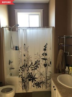 a white toilet sitting next to a bath tub in a bathroom with a shower curtain