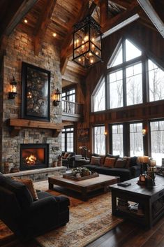 a living room filled with lots of furniture and a fire place in the middle of it