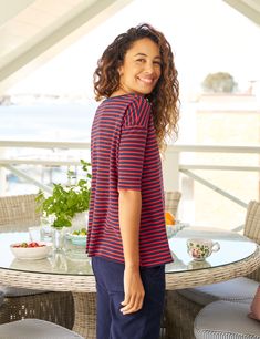 This is the French girl-inspired tee you’ll reach for on the regular. Relaxed but never slouchy, it’s one of those perfect-fitting styles that looks instantly cool. Sure, our signature raw hem (which hits right below the hips) is flattering, but the elbow-length sleeves make this piece a daily uniform staple. Red Short Sleeve Tops For Loungewear, Red Relaxed Fit Top For Loungewear, Red Relaxed Fit T-shirt For Loungewear, Frank And Eileen, Daily Uniform, Red French, French Stripes, Frank & Eileen, Women's Tank Tops