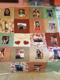 a quilt with many pictures on it and some hearts in the center, all pinned together