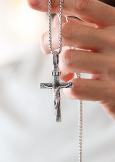 A Catholic Silver Cross is the perfect way to show your faith and devotion. This beautiful and intricate cross symbolizes the love and mercy of God. Crafted with exquisite attention to detail, it’s a stunning reminder of your faith that you can carry with you. Let it be a sign of your enduring faith. Sterling silverPendant: 65 x 35 mmBail size: 12.8 x 6.5 mmPlease note: pendant only; chain sold separatelyShown with: ROUND BOX SILVER CHAIN (2.6 MM) Processing time 1-3 business days Spiritual White Gold Crucifix Cross Necklace, White Gold Crucifix Necklace Spiritual Style, Spiritual White Gold Crucifix Necklace, White Gold Crucifix Necklace, Engraved White Gold Cross Necklace, Engraved Cross Jewelry For Blessing, Luxury Sterling Silver Cross Necklace, Luxury Silver Cross Necklace, Luxury Silver Cross Necklace As Gift