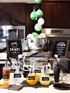 an assortment of drinks on a kitchen counter