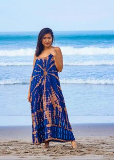 This is a stunning racerback maxi dress with a unique boho bamboo tie dye design. Made from 100% super soft rayon fabric,this dress is great for any occasion. Our dress also features a rope shoulder strap design or a super comfortable free flowing fit. This is a one size dress that will fit sizes small to large, it does not come in sizes. As always please check the measurements we provided to avoid returns, and if your not sure feel free to contact us with your concerns. Measurements: 20 inches Cheap Tie-dye Beach Dresses, Cotton Yellow Dress, Convertible Wrap Dress, Linen Tunics For Women, Boho Maternity Dress, Turquoise Bridesmaid, Turquoise Bridesmaid Dresses, Carrie Dress, Striped Linen Dress