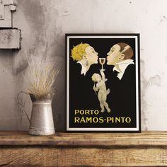 a couple kissing while holding a glass of wine in front of a metal vase on a shelf