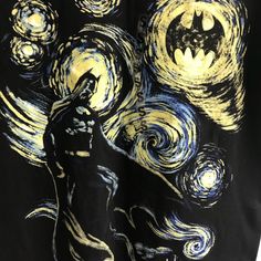 a batman t - shirt with the painting's image on it, and stars in the background