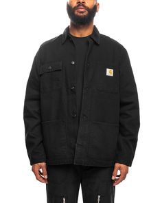 The Michigan Coat is constructed in Carhartt's 12 oz organic and untreated cotton Dearborn Canvas, meaning that the style will soften with wear over time, creating a fit that is unique to the wearer. Inspired by a classic chore coat silhouette, the garment is cut in a regular fit and features a striped blanket lining for warmth. A corduroy collar and front patch pockets offer tactile touches, while triple-stitch details provide extra durability. We recommend ordering a size up if you intend to l Carhartt Michigan Coat Outfit, Carhartt Michigan Coat, Carhartt Jacket Outfit, Carhartt Outfit, Texas Outfits, Carhartt Chore Coat, Jackets Design, Striped Blanket, Corduroy Top