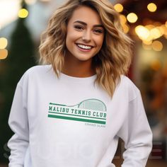 Order by December 9th, to help ensure delivery via USPS by 12/24. 📦 This preppy-style college sweatshirt will be the perfect sporty addition to your wardrobe this year. Crafted with care and printed on premium, soft fabric, this sweatshirt seamlessly combines athletic flair with comfort, making it the perfect gift for anyone who loves to embrace their athletic style with a touch of elegance. * PRODUCT DETAILS - Unisex Sweatshirt - Printed with ink - Ribbed knit collar, retains its shape even af Sporty Logo Print Sweatshirt For College, Branded Sweatshirt For Sports Events, Sporty Branded Sweatshirt For Sports Events, College Sports Season Sweatshirt With Logo Print, College Sweatshirt With Logo Print For Sports Season, White School Spirit Sweatshirt With Ribbed Cuffs, College Logo Print Sweatshirt, White College Sweatshirt With Branding, White Sweatshirt With Ribbed Cuffs For School Spirit