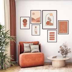 a living room filled with furniture and pictures on the wall