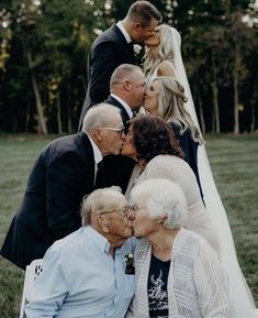 an older couple kissing their parents on the cheek