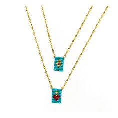 two necklaces that have been made out of gold chains and turquoise beaded beads