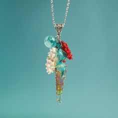 "This Teal ocean necklace is made of glass in the lampwork technique, each bead is hand blown and unique. This Nautical necklace is lightweight, stylish and elegant and will become a versatile and irreplaceable addition to your everyday outfits! 💕 You will definitely look stunning in this glass mermaid necklace! Dimensions: total pendant height about 2 3/4 inch (70mm). Silver colored metal chain length is adjustable, 16\"-20\" inches (40-50cm). Materials: artist lampwork glass beads, metal fitt Whimsical Czech Glass Necklaces For Gifts, Whimsical Czech Glass Necklaces As Gifts, Whimsical Czech Glass Necklace For Gift, Ocean-inspired Pendant Necklace With Lobster Clasp, Ocean-inspired Silver Glass Necklace, Ocean-inspired Silver Glass Jewelry, Bohemian Mermaid Necklace For Gifts, Bohemian Mermaid Necklace Gift, Unique Glass Necklace For Beach