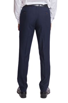 The downing suit pants are crafted from the same poly-rayon blend as the jacket, ensuring a cohesive and polished look. These slim-fit trousers feature a slant front pocket and a welt back pocket for added functionality. Whether you're heading to the office or out for an evening event, these pants offer both style and comfort, making them a versatile addition to your wardrobe.PRODUCT DETAILS: style 6427P slim-fitting suit pant slant front pockets welt back pockets 32-inch inseam with finished he Blue Suits With Welt Pockets And Tapered Legs, Blue Tapered Leg Business Suits, Slim Fit Straight Leg Suits For Business Casual, Blue Slim Fit Straight Leg Suit, Blue Tapered Leg Suit For Formal Occasions, Blue Tapered Leg Formal Suit, Slim Fit Suit With Welt Pockets And Straight Leg, Slim Fit Suit With Straight Leg And Welt Pockets, Fitted Blue Suit With Tapered Legs