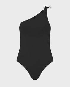 The Callie One Piece in Black is a contemporary one shoulder swimsuit featuring a unique twist detail on the shoulder, regular bottom coverage and a medium to high cut leg. Callie is self-lined in our ultra-soft Embodee™ fabric with high shaping power. This elegant one piece doubles as a bodysuit and pairs perfectly with black linen pants. Luxury fabric sustainably made in Italy.Garment sustainably made in Australia. Black Linen Pants, One Shoulder Swimsuit, Luxury Fabric, Designer Swimwear, Black Linen, Black Swimsuit, Cool Suits, High Cut, Linen Pants