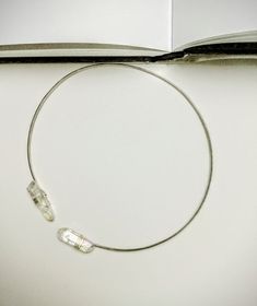 torque choker crystal necklace simple neck ring minimalist Minimalist Adjustable Crystal Choker Necklace, Minimalist Adjustable Crystal Choker, Minimalist Adjustable Wire Wrapped Crystal Necklaces, Clear Adjustable Minimalist Jewelry, Minimalist Clear Adjustable Jewelry, Torque Necklace, Wire Choker, Neck Ring, Silver Choker