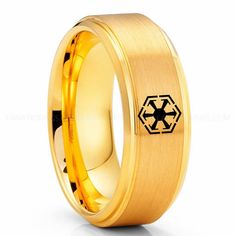 the star wars symbol is engraved on an 18k yellow gold plated wedding ring