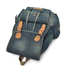 This solid backpack with drawstring design from Innovato Design is handcrafted from genuine denim and polyester materials great for daypack travel adventures. It has multi-functional slot compartments, very durable in vintage colors. It has an interior computer interlayer, compartment, slot and zipper pocket, and a zipper closure type. Get yours now, and add style to your sporty look.  Product highlights:   Made from 100% high-quality materials  Carrying System: Arcuate Shoulder Strap  Bag dimension: 30cm x 16cm x 39cm  Capacity: 20 to 35 Litre Travel Daypack, Shoulder Strap Bag, Strap Bag, Sporty Look, Vintage Colors, Zipper Pocket, Blue Denim, Shoulder Strap, Highlights