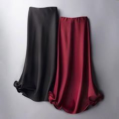 An elegant essential for any woman’s wardrobe, our High Waist Solid Satin Skirt will take your look to the next level. Featuring a high-waisted and flowing silhouette and a tasteful ruffled hem, this skirt is an elevated piece, perfect for the more formal events in your life. Plain Skirt, Mid Calf Skirt, Satin Fashion, Satin Maxi Skirt, Silk Midi Skirt, Formal Skirt, Long Skirts For Women, Half Skirt, Skirt Midi