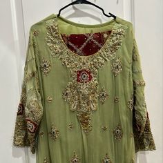 Like Green Red Gold Heavy Stone Work Fancy Shaadi Used Once Size Appropriately Large Disclaimer: - Sizes May Vary From What Is Written On The Tag Ie. 2 Different Large Kurtas Wont Fit The Same. Measurements Taken Upon Request Please Do Not Hesitate To Ask For Closer/Clearer/More Pictures, Measurements And Any Questions You May Have. Multicolor Kurta Pakistani Indian Pakistani Clothes Indian Clothes Eid Eid Fit Muslim Islam Modest Eid Clothes Salwar Kameez Dress Shaadi Wear Shaadi Outfit Indian O Formal Green Anarkali Set With Dabka Embroidery, Formal Green Anarkali Set With Dabka Detailing, Formal Green Anarkali Set With Dabka, Formal Naqshi Semi-stitched Lehenga, Formal Semi-stitched Naqshi Lehenga, Green Bollywood Anarkali Set For Formal Occasions, Green Anarkali Set For Eid Formal Occasion, Festive Formal Lehenga With Naqshi Detailing, Festive Formal Lehenga With Naqshi