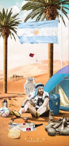 a man sitting on the ground in front of a tent and some food next to two palm trees