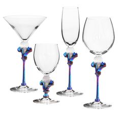 Kahuna Goblets by Minh Martin. Lively and sculptural, these blown glass pieces offer a distinctive take on barware. The iridescence is created using reactive titanium. Sold individually. Choose style (shown left to right): Martini Glass (12oz) Water Glass (14oz) Flute Glass (8oz) Wine Glass (18oz) Fancy Glassware, Unique Wine Glasses, Gold Kitchen Accessories, Glass Drinkware, Fenton Glassware, Glass Art Pictures, Painted Glass Art, Blue Glassware, Wine Glass Art