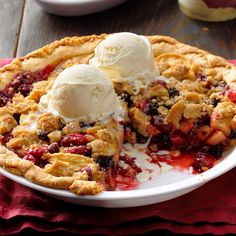 a pie with two scoops of ice cream on top