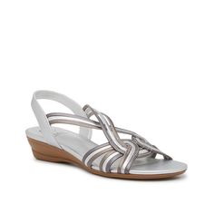 Impo-Ravi Wedge Sandal Keep it classic with the Ravi wedge sandal from Impo. This pair features interwoven elastic straps for a secure fit and a wedge heel for sturdy steps. Silver Wedge Sandals With Cushioned Footbed, Casual Silver Wedge Heel Sandals, Silver Wedge Heel Sandals With Removable Insole, Wedge Sandal, Wedge Heels, Wedge Sandals, Metallic Silver, Wedges, Customer Service