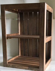 a wooden shelf sitting on top of a white counter