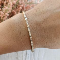 Our Toryn baguette round alternating diamond bracelet is available in lab grown and natural diamonds and can be customized with larger diamonds or different gemstones. Contact us for a quote on any customization to get started on a custom order: http://etsy.me/1231fkN Details: - Made in New York, USA. - Bracelet is 7 inches in length, and 2.3mm wide. Contact us for different dimensions. - Choose between lab grown (VS+F) or Natural diamonds (VS+G) - Approximate carat weight is 1 carat. - High pol Yellow Gold Diamond Bracelet With Baguette Diamonds, Yellow Gold Diamond Bracelet With Baguette Cut, Timeless Yellow Gold Diamond Bracelet With Baguette Diamonds, 14k Yellow Gold Diamond Bracelet With Baguette Cut, Yellow Gold Baguette Diamond Bracelet Gift, Usa Bracelet, Diamond Bangles Bracelet, Cvd Diamond, Types Of Diamonds