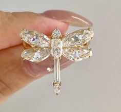 Dragonfly Wedding Ring, Libellule Insect Animal Ring, Multi-Cut Moissanite Ring, Dainty Engagement Ring-For Her, 14K Gold Ring, Diamond Ring Item Description: Stone - Moissanite & Simulated Diamond Shape- Multi Cut 1. White Gold: 10K/14K/18K 2. Yellow Gold: 10K/14K/18K 3. Rose Gold: 10K/14K/18K 4. Silver: Sterling Silver 925 Size Customization: What Size you want... * You can also Customize ring size in US 4 to US 12! It sometimes affects to price. * Main Stone & Shape Customization: Main Stone: Dragonfly Engagement Ring, Dragonfly Wedding, Engagement Ring Dainty, Dainty Engagement, Animal Ring, Cvd Diamond, Engagement Ring Shapes, Solid Gold Ring, Animal Rings