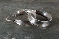 International deliveries in 2-4 business days as standard shipping. Totally handmade from 925 solid sterling silver. This beautiful medium size, handcrafted hoop earrings are 45 mm(1,77 )long made of sterling silver with Inside diameter 35mm (1.38 inch). They add just a sparkle in our outfit! Perfect gift for her. It comes gift wrapped and ready for giving! ✿REGISTERED MAIL WITH TRACKING NUMBER ✿All of our jewelry are made to order. Allow for about a week for the jewelry to be made. ✿ keep in mi Sterling Silver Clasp Hoop Earrings As Gift, Silver Hand Forged Hoop Earrings For Anniversary, Handmade Silver Small Hoop Earrings, Silver Hoop Earrings With Sterling Silver Clasp, Small Hoop Earrings With Sterling Silver Clasp For Anniversary, Modern Handmade Hoop Earrings For Anniversary, Handmade Modern Hoop Earrings For Anniversary, Silver Hand Forged Hoop Earrings, Silver Teardrop Hand-forged Hoop Earrings