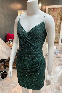 Modsele dark green sequined short party dress features V-neckline, spaghetti straps and ruched side.
Product Details:

SKU:PD2754
Sequins material
Mini length
Size: US 0- 16. Check our Size Chart to get your correct size. 
Recommend custom size for plus size.
Free custom size service is available. Email your exact measurements once order is placed. 
Fully lined & Built with bra
Time: 10-15 business days. 

Feel free to contact our customer service: contact@modsele.com if you have any questions. Dark Green Hoco Dress, Dress Mini Prom, Cocktail Dress Mini, Green Hoco Dress, Nye Party Dresses, Green Homecoming Dresses, Mini Prom Dresses, Hoco Dress, Short Party Dress