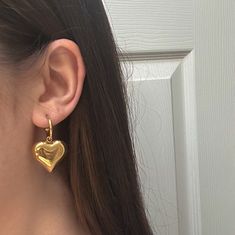 "The Mila Heart Hoop Earrings ✨ Waterproof Hoops with a Puffy Heart Pendant (3/4\" in length and width- just under an inch!) Choose between silver or gold  (18k Gold Plated Stainless Steel or Solid Stainless Steel) Hypoallergenic, Can be worn all the time! 🫶 Made with love" Earrings Outfit, Hoop Drop Earrings, Gold Heart Earring, Earrings Aesthetic, Drop Earrings Gold, Heart Hoop Earrings, Puffed Heart, Puffy Heart, Gold Drop Earrings