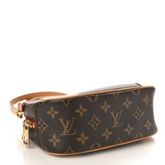 This is an authentic LOUIS VUITTON Monogram Deauville Mini. This classic crossbody bag is finely crafted of classic Louis Vuitton monogram coated canvas in brown. The bag features a full exterior pocket, vachetta cowhide leather trim, and polished gold-toned hardware. The double wrap-around zipper opens to a burgundy fabric interior with a pocket. Classic Crossbody Bag, Burgundy Fabric, Authentic Louis Vuitton, Leather Trim, Cowhide Leather, Leather Trims, Louis Vuitton Monogram, Crossbody Bag, Louis Vuitton