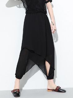 Sku CY-!23554 Material Chiffon Style Loose Feature Split-side , Split-joint Occasion Going out , Casual Seasons Summer Type Casual Pants Bottoms Color BLACK Size FREE SIZE Size chart: Please consult the size chart we provide for this item's measurements to help you decide which size to buy. Please note: There may be 1-3cm differ due to manual measurement. CMINCH Cm Waist Hips Length FREE SIZE 66-96 112 88 Chic Asymmetrical Hem Pants, Chic Pants With Asymmetrical Hem, Black Harem Pants With Elastic Waistband For Spring, Black Baggy Ankle-length Harem Pants, Black Ankle-length Pants With Elastic Waistband, Chic Black Stretch Harem Pants, Summer Stretch Pants With Asymmetrical Hem, Stretch Pants With Asymmetrical Hem For Summer, Black Ankle-length Harem Pants With Elastic Waistband