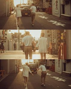 two men walking down the street holding hands