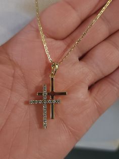 Beautiful Jesus Double Cross Necklace (14K Gold Plated).  Perfect for mother's Day or any Occasion.  Chain Size: 18 inches Pendant Size: 1.15 inches Necklace Care Instructions -REMOVE BEFORE ENTERING IN WATER -AVOID DIRECT CONTACT WITH PERFUME OR ABRASIVES -REMOVE BEFORE SLEEPING -REMOVE BEFORE WORKING OUT -STORE IN AN AIR-TIGHT JEWELRY BOX -CLEAN AND POLISH WITH SOFT CLOTH -----------Enjoy your necklace------------- Gold Cross Birthstone Jewelry, Diamond Cut Cross Necklace For Anniversary, Gold Sterling Silver Cross Necklace For Anniversary, Gold Diamond Cut Cross Necklace As Gift, Diamond Cut Round Cross Necklace For Anniversary, Round Diamond Cut Cross Necklace For Anniversary, Gold Cross Jewelry With Birthstone, Yellow Gold Cross Necklace With Diamond Cut As Gift, 14k Gold Cross Necklace With Diamond Cut As Gift