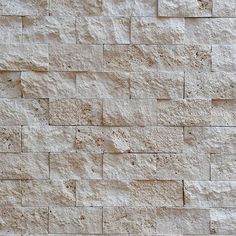 a white brick wall with no mortars on it