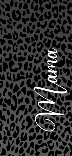 a black and white leopard print background with a christmas tree on it's side