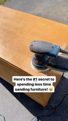 an electric sanding machine sitting on top of a wooden table with the words here's the f7 secret to spending less time sanding furniture