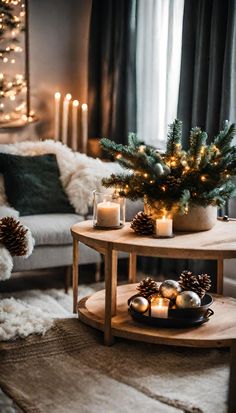 a living room with christmas decorations and candles on the coffee table in front of a couch