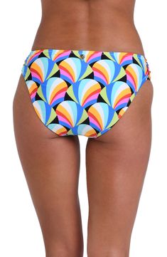 This bright print features a geometric pattern of colorful, interlocking crescent shapes creating a dynamic and playful appearance. A hipster silhouette with hip-flattering shirring on each side offers just-right coverage to keep the look sophisticatedly seductive. [split] Details Hipster bikini bottoms Hip-flattering side shirring Moderate coverage in the back Fabric 83% Nylon, 17% Lycra Elastane Retro Multicolor Printed Bottoms, Vibrant Multicolor Swim Bottoms, Retro Stretch Multicolor Swimwear, Retro Multicolor Stretch Swimwear, Multicolor Stretch Swimwear With Vibrant Print, Multicolor Vibrant Print Swimwear, Retro Multicolor Printed Swimwear, Playful Multicolor Printed Bottoms, Multicolor Bottoms With Geometric Pattern For Summer