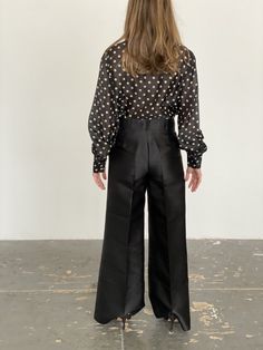 "Oscar de la Renta gorgeous black silk wide leg pants. Pleated line down the middle, high waisted and no pockets for a slim hip line. A thick structured silk, these pants are perfect for black tie outfit. Waist 28\" Rise 10.5\" Inseam 30\" Hips 40\" Leg opening 13\" Fit a S or M" High-waisted Silk Wide Leg Pants For Evening, Silk High-waisted Wide Leg Evening Pants, Silk High-waisted Wide Leg Pants For Evening, Chic Silk Wide Leg Formal Pants, Chic Silk Wide Leg Pants For Formal Occasions, Chic Black Semi-formal Pants, Chic Silk Wide Leg Pants For Work, Silk Wide Leg Pants For Work, Formal Silk Wide Leg Pants