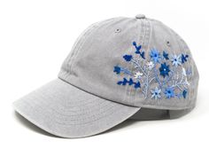 This hand embroidered flower baseball cap is a one-of-a-kind accessory that combines style and comfort. The cap is crafted from high-quality material, ensuring durability and comfort. The intricate floral design is hand-embroidered, giving each cap a unique touch and making it a standout piece. Whether you're running errands or enjoying a day outdoors, this cap will keep the sun out of your eyes in style. Bee and flower is 100% hand embroidered on a 100% cotton baseball cap. Hat is one size fits all with adjustable back strap. Unique cap, be happy! I am also open for customization. If you want the item in different colors, please message me, it will take additional 2-3 days of handling time. Free first class shipping, upgradable priority mail service. 30 days return policy, feel confident Cheap Baseball Cap With Embroidered Logo And Short Brim, Embroidered Caps For Women, Snake Hat, Ball Caps For Women, Hand Embroidered Flower, Bone Bordado, Bee And Flower, Custom Embroidered Hats, Pretty Hats