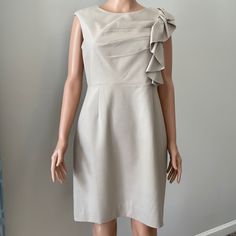 Never Worn Sleeveless Dress. Zip Back With Hook Closure And Vented Back. Size 12p. Smoke And Pet Free Home. Elegant Beige Sleeveless Dress With Ruffles, Calvin Klein Elegant Sleeveless Formal Dress, Fitted Sleeveless Beige Dress With Ruffles, Fitted Beige Sleeveless Dress With Ruffles, Calvin Klein Sleeveless Lined Mini Dress, Calvin Klein Knee-length Ruffled Dress, Calvin Klein Ruffled Dresses For Work, Sleeveless Calvin Klein Mini Dress For Formal Occasions, Calvin Klein Sleeveless Lined Midi Dress