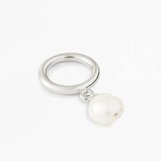 Nova ring in sterling silver with freshwater pearl.    - band width: 3.5mm  - pearl diameter: 12mm  - fit: true to size  - nickel free rhodium plating  - base metal is recycled sterling silver  - handcrafted in high polish  - every pearl is unique in shape and color  - myw05ss217pl Sterling Silver White Gold Pearl Ring With Pearl Drop, Sterling Silver Pearl Drop Ring In White Gold, White Gold Pearl Drop Ring In Sterling Silver, Minimalist White Gold Pearl Drop Ring, Sterling Silver Pearl Drop Ring, White Gold Sterling Silver Open Pearl Ring, Modern White Gold Sterling Silver Pearl Ring, Silver Pearl Ring With Pearl Drop, Silver Pearl Drop Ring