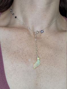 Ethiopian opal, Herkimer diamond & iolite choker. Perfect for summer as this stone looks like it has glitter inside. The glitter effect is visible in sunlight and especially indirect/indoor light. The opal also happens to be shaped like Florida 🙂 The choker is 14.5 inches with a 3 inch drop. It clasps in the front where there is a small iolite accent. The opal is hanging below a chain of Herkimer diamonds that extends up the chain and transitions to iolite. Opals are very difficult to photo Opal Jewelry With Stones As A Gift, Opal Jewelry With Stones For Gift, Opal Jewelry Gift, One Of A Kind Opal Jewelry Gift, Opal Jewelry With Natural Stones For Gift, Opal Jewelry With Natural Stones As A Gift, One Of A Kind Silver Opal Jewelry, Unique Gold Opal Jewelry, Silver Opal Birthstone Jewelry